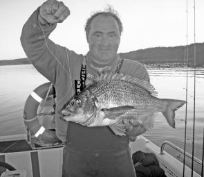Norm Conlin with one of many tailor caught in a hectic session.